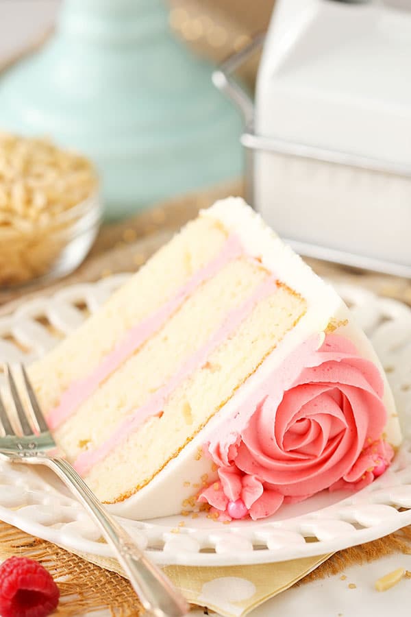 Raspberry Almond Layer Cake! Such a light, moist cake with fresh raspberry frosting!