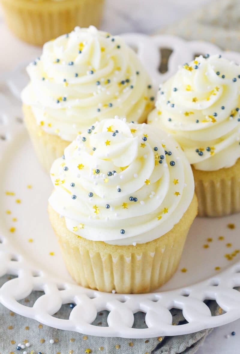 Overhead view of a plate of moist vanilla cupcakes