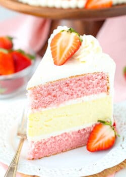 slice of Strawberries and Cream Cheesecake Cake