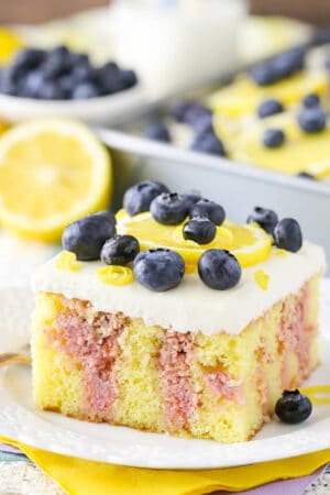 Image of Lemon Blueberry Poke Cake slice