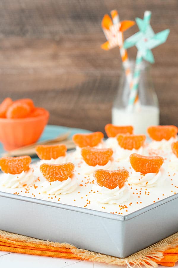 Image of an Orange Creamsicle Poke Cake in a Pan