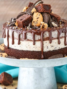 A whole Oreo Brookie Ice Cream Cake on cake stand.