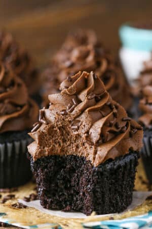 Moist Homemade Chocolate Cupcake with chocolate frosting with a bite taken out