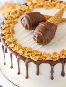 Overhead image of Peanut Butter Chocolate Ice Cream Cone Cake on a cake stand.