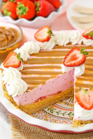 Image of Strawberry Dulce De Leche Ice Cream Pie with slice removed