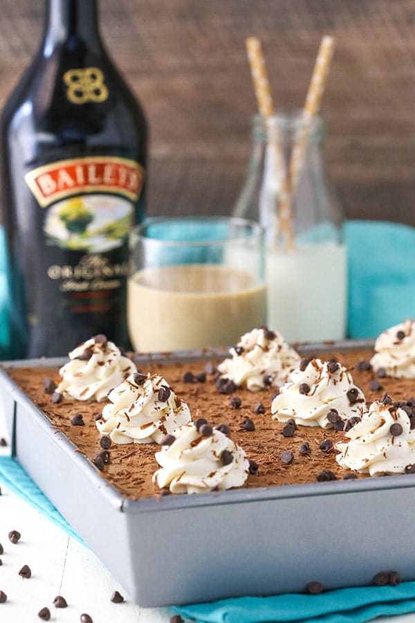 Baileys Chocolate Mousse Brownie Cake with Baileys in background