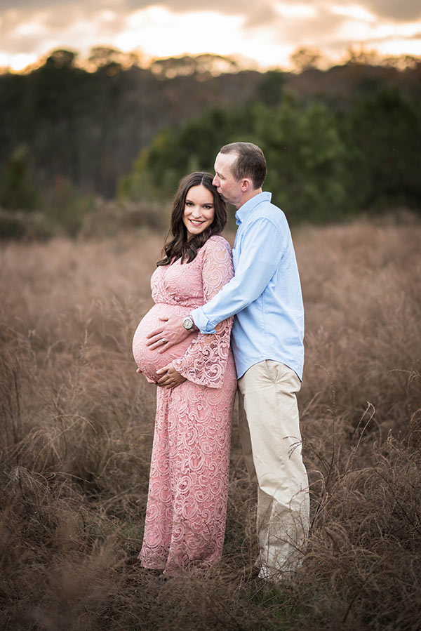 Lindsay's Husband Kissing the Back of Her Head with a Hand on Her Belly