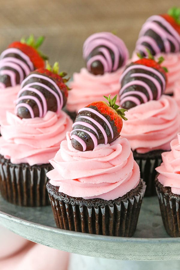 Chocolate Covered Strawberry Cupcakes displayed on silver stand