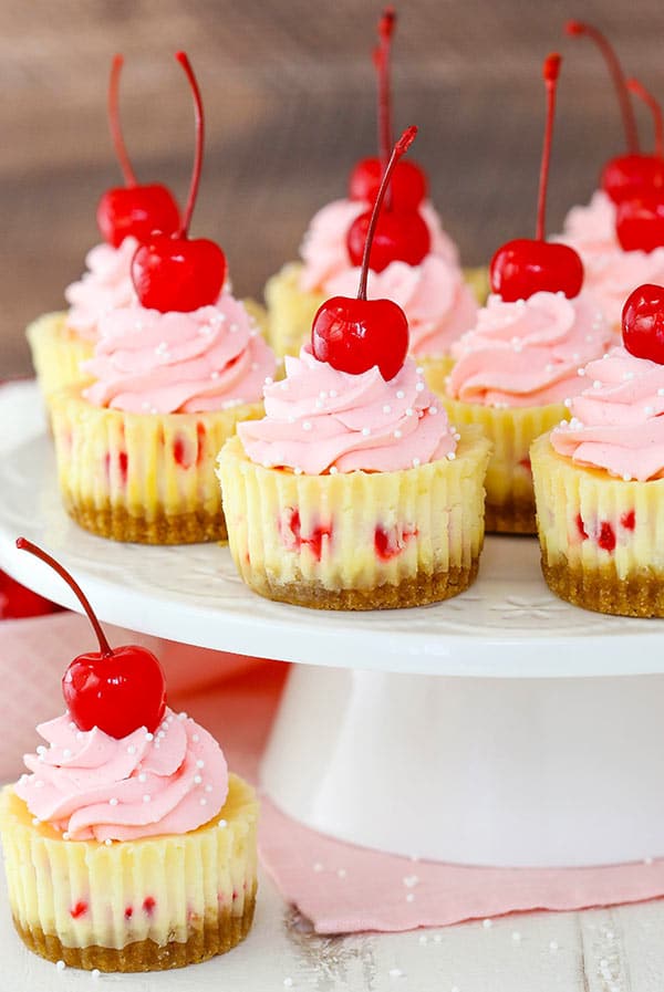 Mini Cherry Almond Cheesecakes on white stand