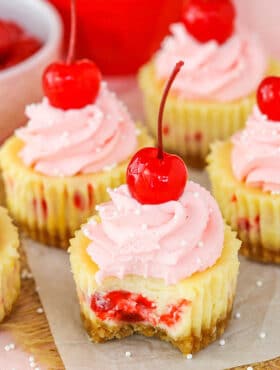 Mini Cherry Almond Cheesecakes with bite taken out