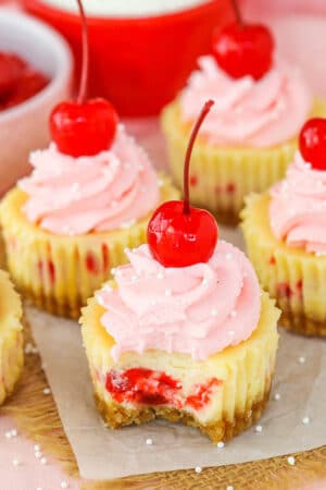 Mini Cherry Almond Cheesecakes with bite taken out