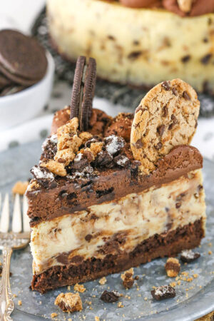 Oreo Brookie Cheesecake on a plate with a fork.