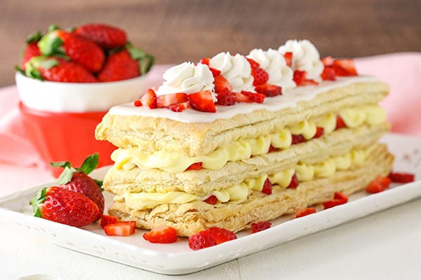 Strawberry Napoleon displayed on white platter