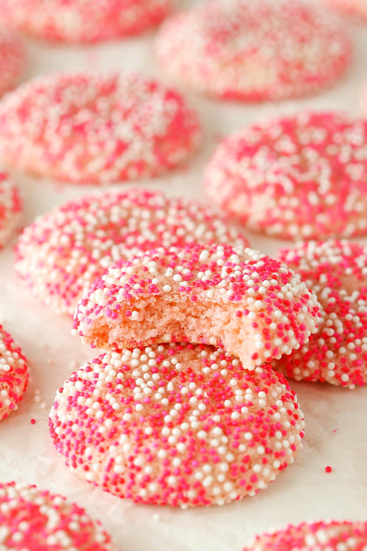 image of Strawberry Sprinkle Cookie with bite taken out