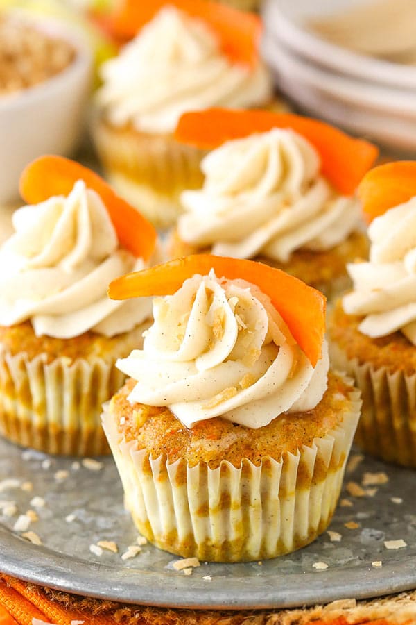 Carrot Cake Cheesecake Swirl Cupcakes on silver platter