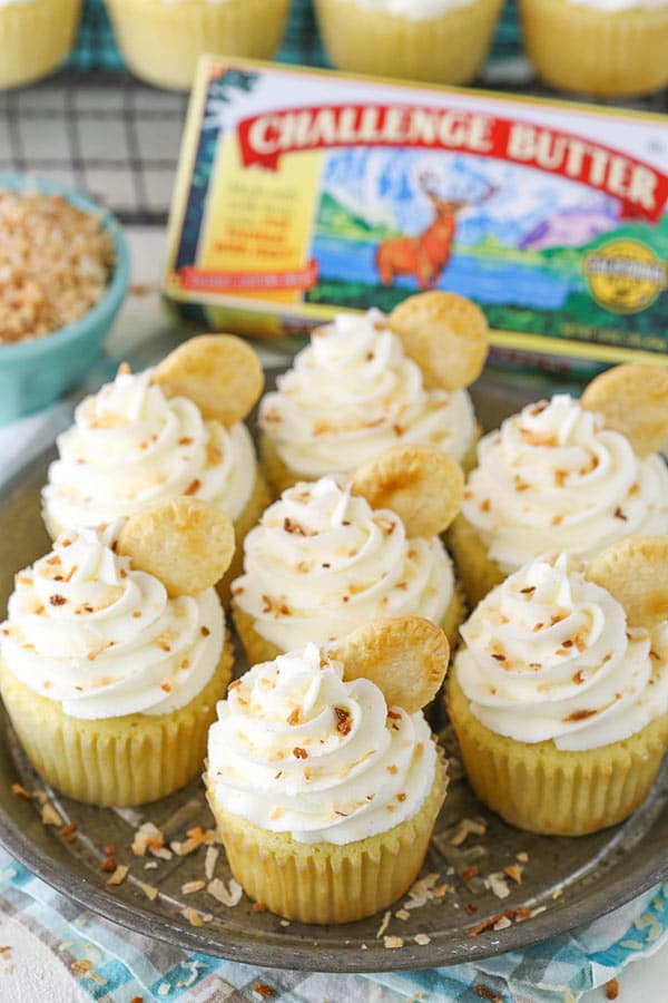 Coconut Cream Pie Cupcakes on silver platter angled view