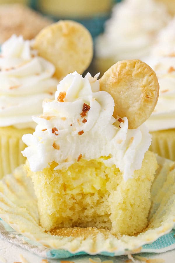 Coconut Cream Pie Cupcakes - coconut cupcakes with a cream pie filling! FULL of coconut flavor! 