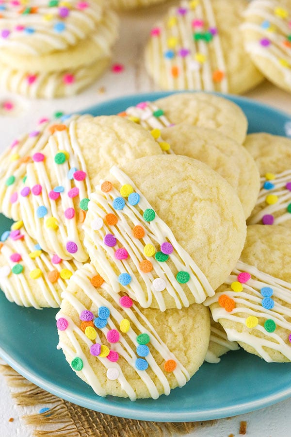 stack of decorated Coconut Sugar Cookies