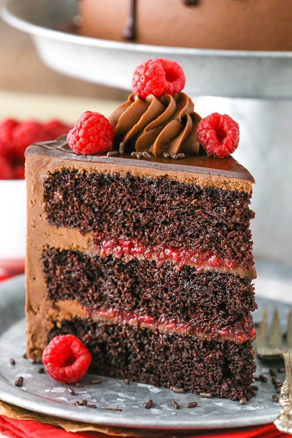 Raspberry Chocolate Layer Cake - layers of moist chocolate cake, chocolate ganache and raspberry filling!