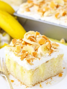 slice of Banana Pudding Poke Cake on plate