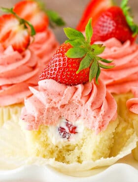 image of Strawberries and Cream Cupcakes with bite taken out