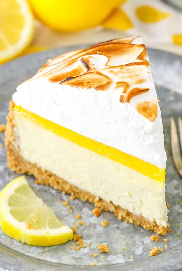 Lemon Meringue Cheesecake! A graham cracker crust, creamy cheesecake, tart lemon topping and toasted meringue!