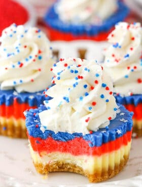 Red, White and Blue Mini Cheesecakes with bite taken out