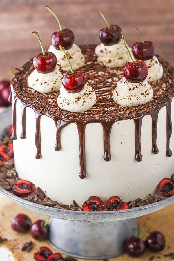 Black Forest Cake - layers of moist chocolate cake, whipped cream, cherries and cherry liqueur! Completely homemade!