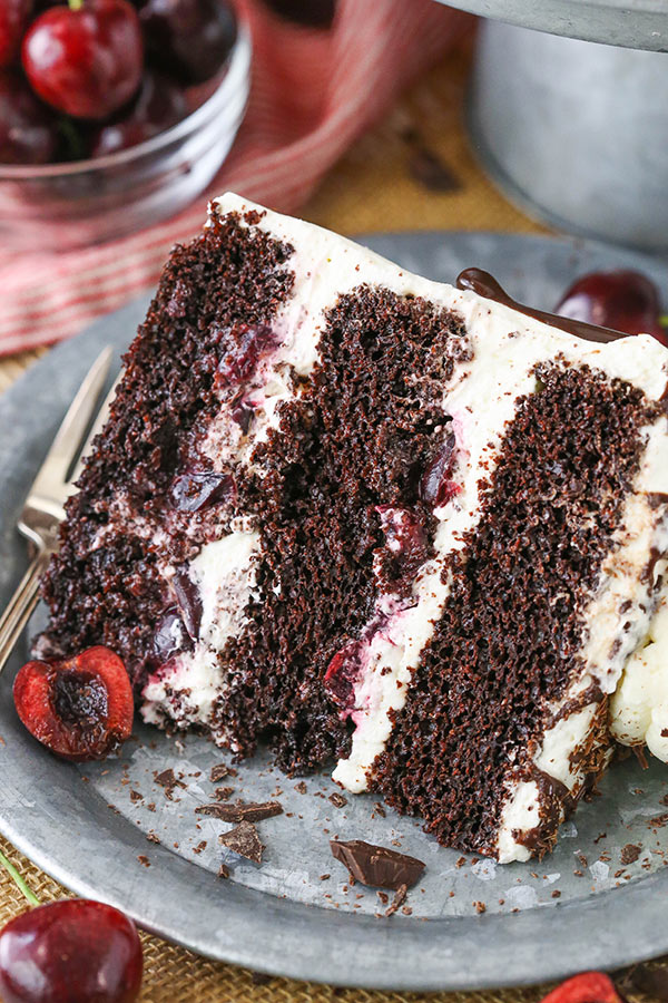 Black Forest Cake - layers of moist chocolate cake, whipped cream, cherries and cherry liqueur! Completely homemade!