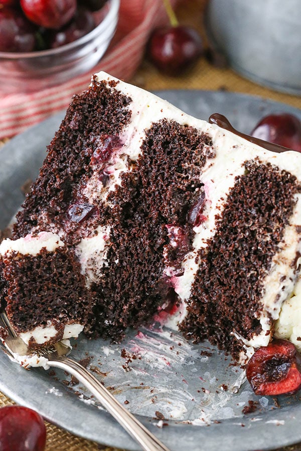 Black Forest Cake - layers of moist chocolate cake, whipped cream, cherries and cherry liqueur! Completely from scratch!