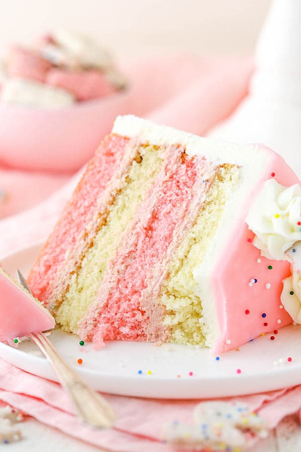slice of Frosted Circus Animal Cookie Layer Cake bite taken