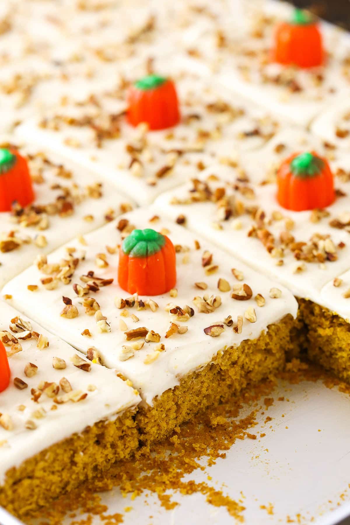 Close-up of pumpkin sheet cake slices.