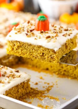 Slice of pumpkin sheet cake on a spatula.