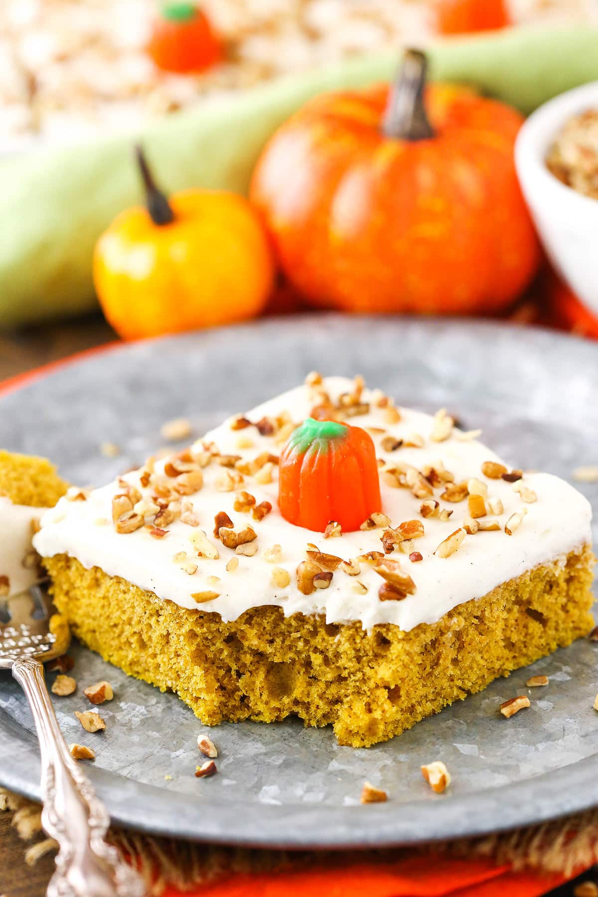 Slice of pumpkin sheet cake in a plate.