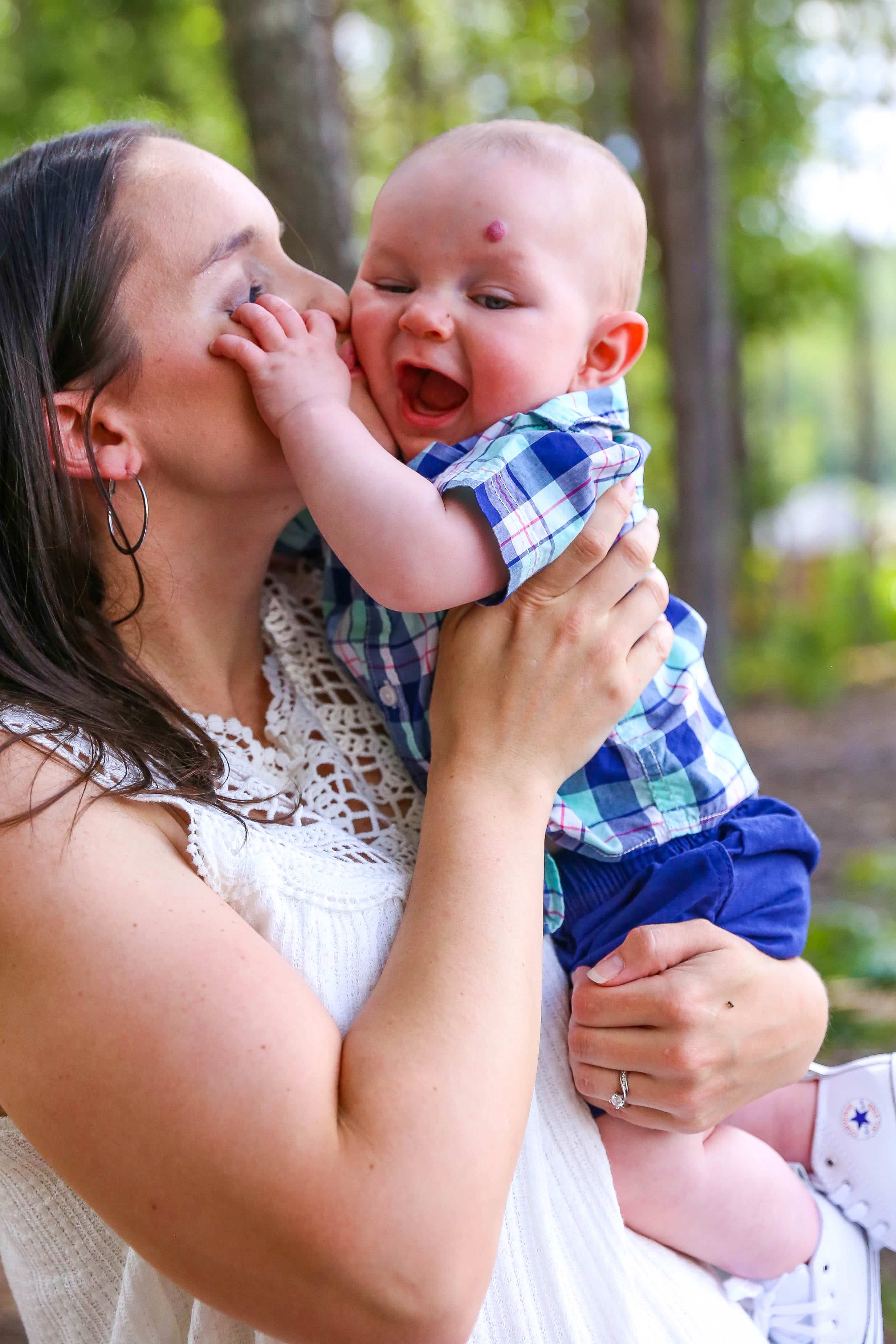 lindsay holding brooks and kissing his cheek