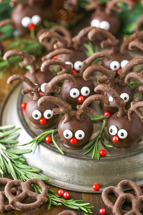 Reindeer Cookie Balls on plate with rosemary