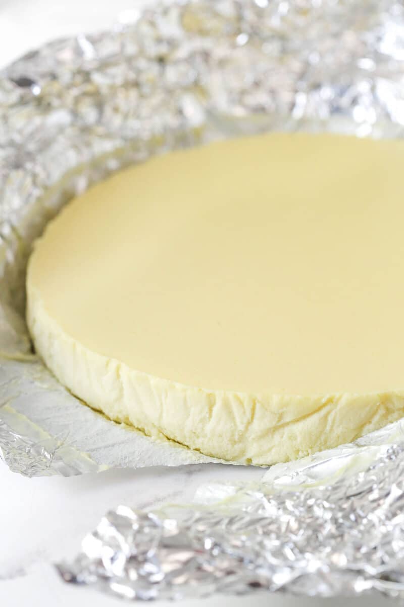 removing aluminum foil from cheesecake layer