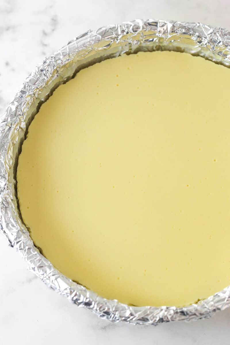 cheesecake layer baked and cooled in the pan