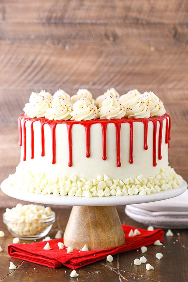 Red Velvet Cheesecake Cake on white stand