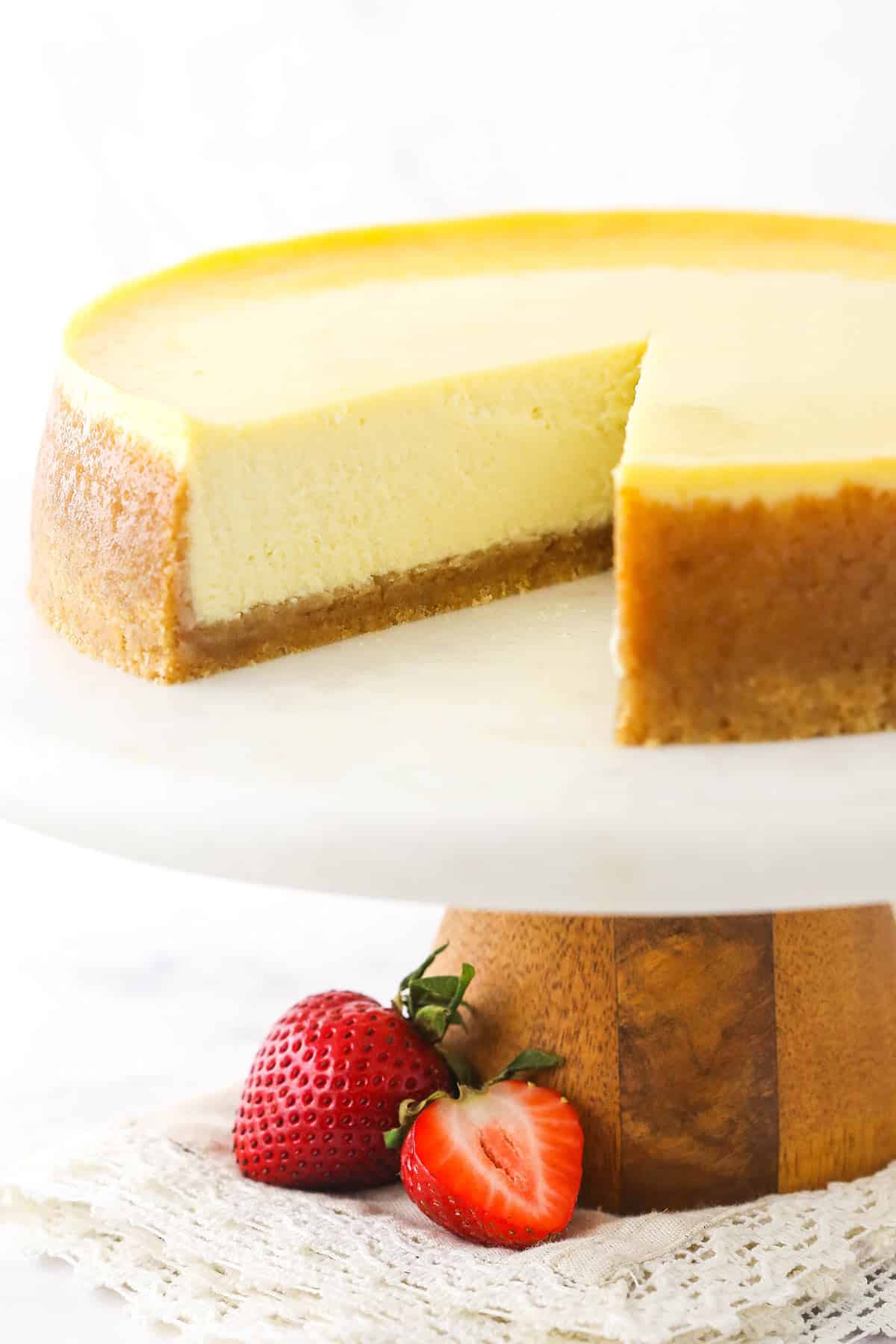Classic cheesecake with a slice taken out