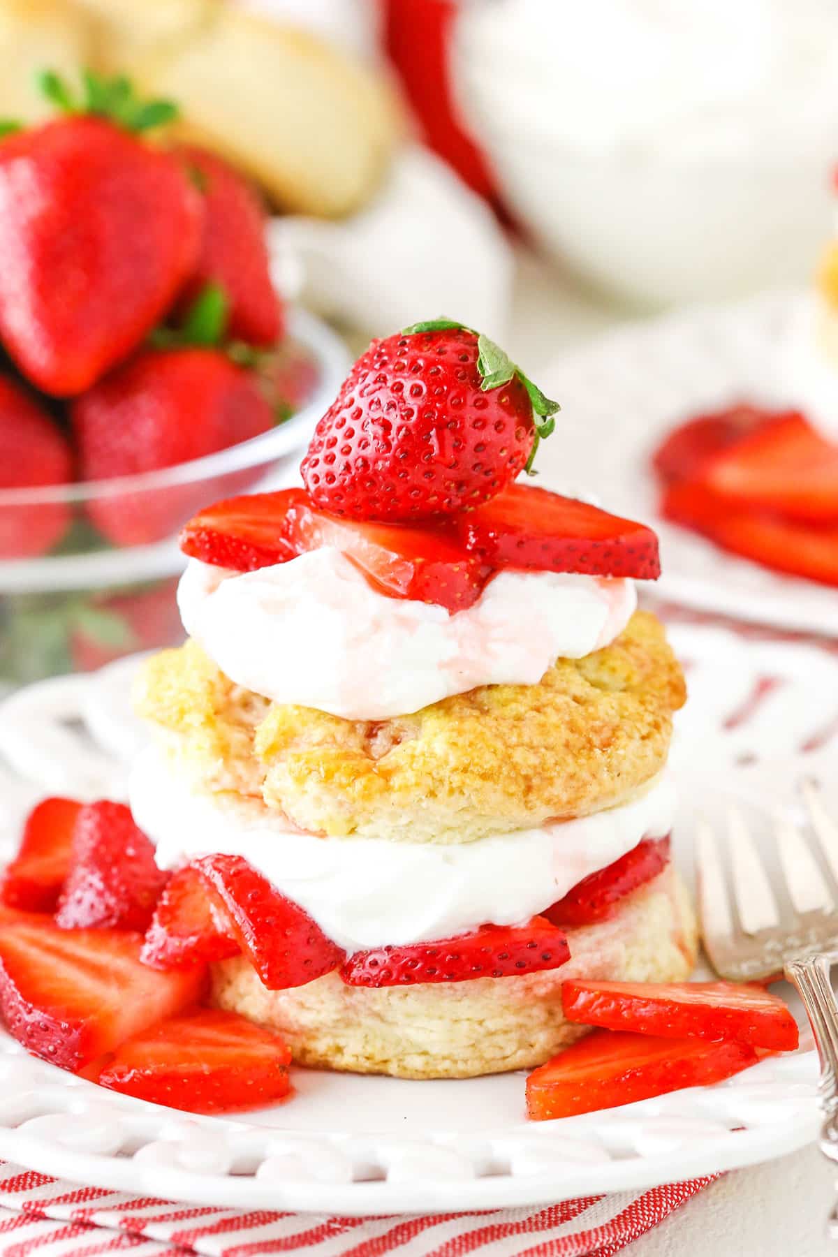 Shortcake biscuits with homemade whipped cream and strawberries.