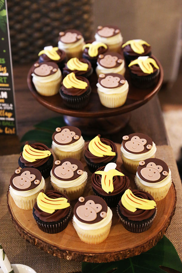 22 Cute Banana and Monkey Birthday Cupcakes on Two Circular Cake Stands