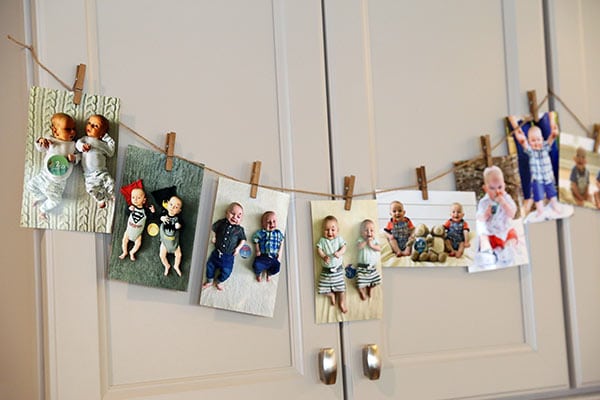 A Mini Clothesline Fastened with Baby Pictures of Ashton and Brooks