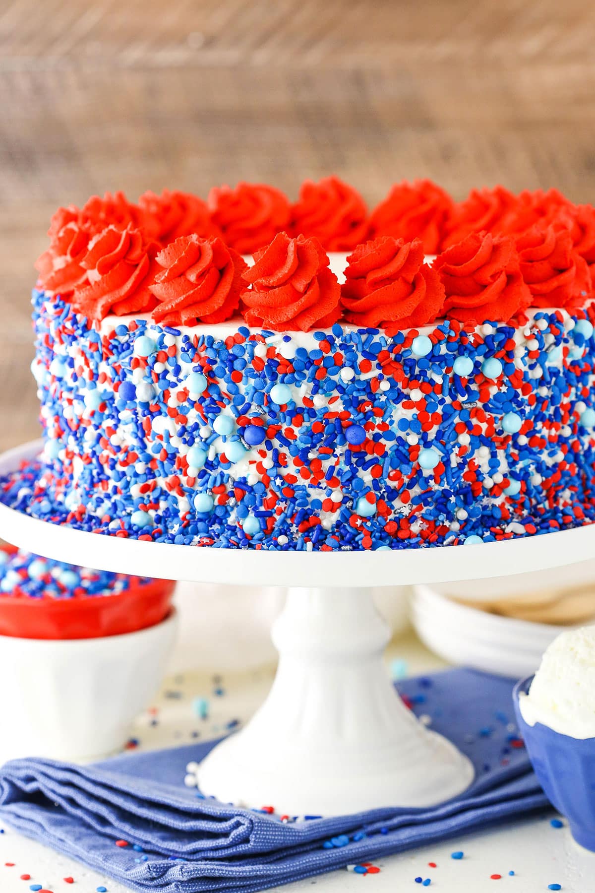 Red white and blue ice cream cake with sprinkles.
