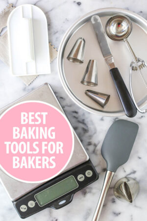 A Food Scale and Other Baking Tools Laid Out on a Marble Counter