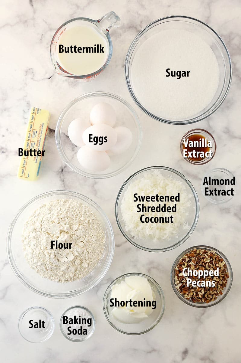 Ingredients for Italian cream cake separated into bowls.