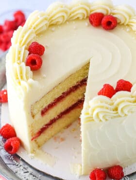 Raspberry Dream Cake - layers of moist vanilla cake, raspberry filling and cream cheese frosting