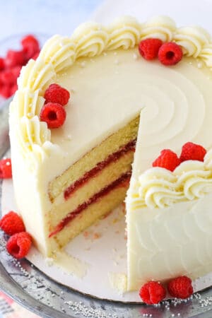 Raspberry Dream Cake - layers of moist vanilla cake, raspberry filling and cream cheese frosting