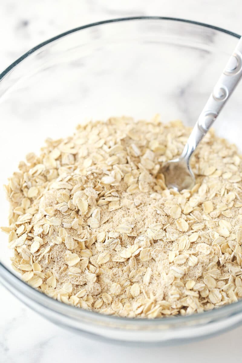 ingredients for streusel combined in glass bowl without the butter