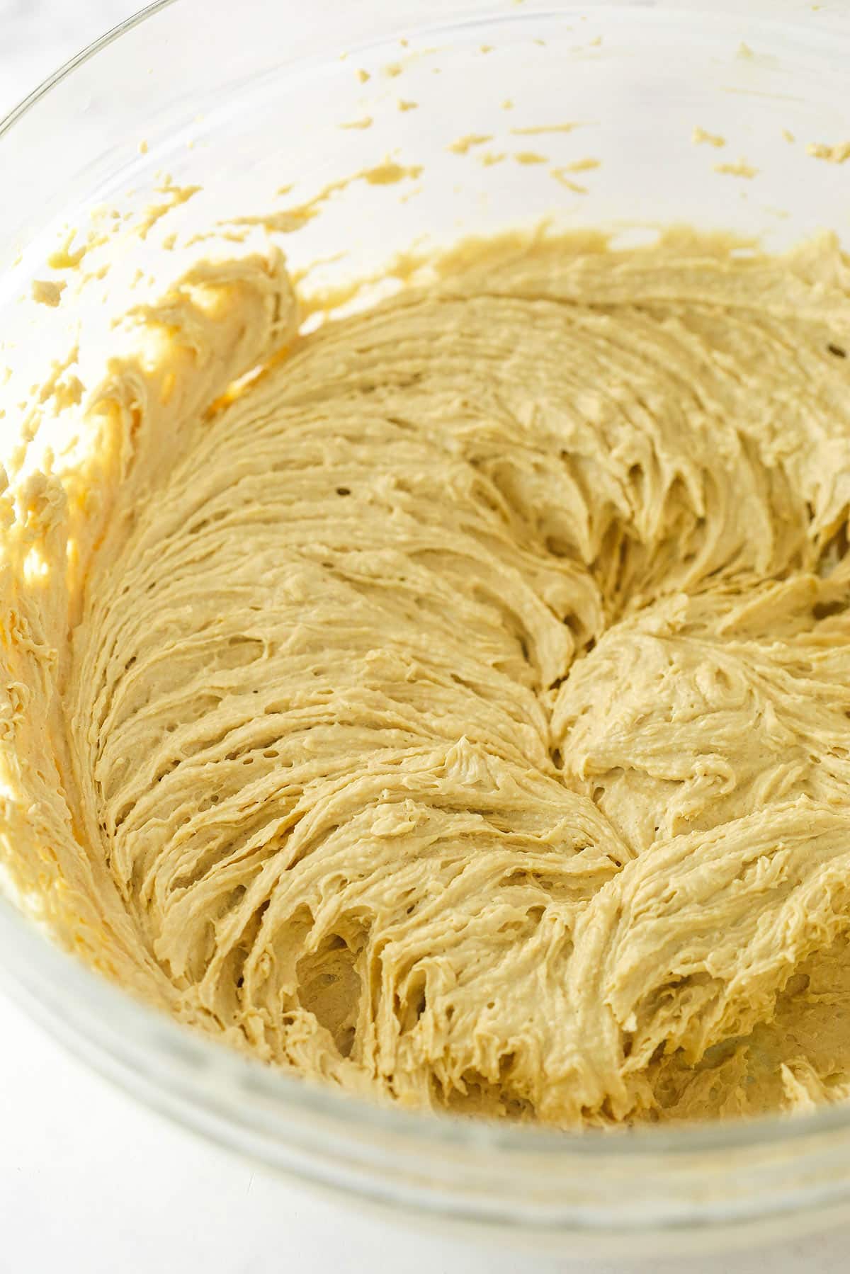 Cook dough with the eggs and vanilla added in a glass bowl.